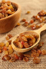 Raisins on sackcloth, closeup