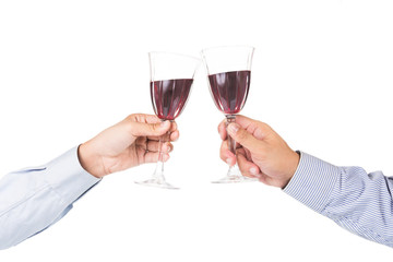 Man in long sleeve shirt toasting red wine in crystal glass