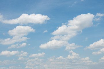 Naklejka na ściany i meble blue sky background with quaint clouds