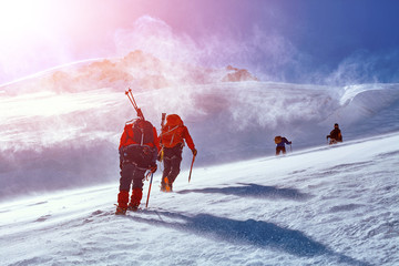 climbers at the top of a pass