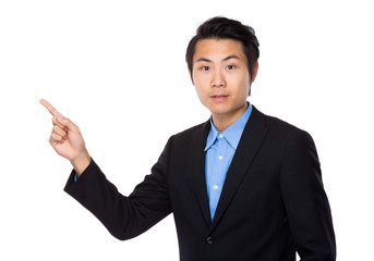 Asian businessman with finger pointing up