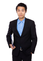 Businessman hand holding with file pad