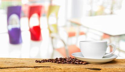 Coffee shop blur background with bokeh image .