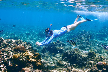 Woman with mask snorkeling - obrazy, fototapety, plakaty