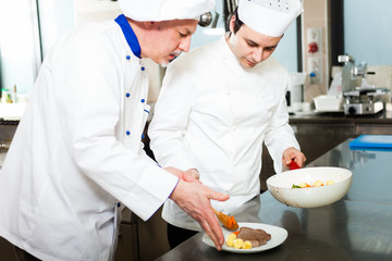 Chefs working in a kitchen