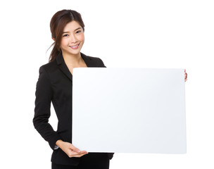 Naklejka premium Asian businesswoman show with white poster