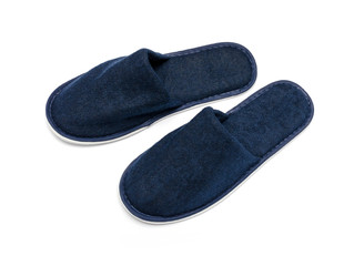 A pair of blue slippers on a white background