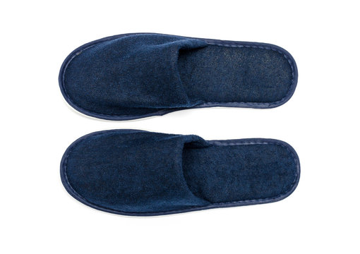 A pair of blue slippers on a white background