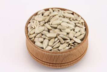 Sunflower seeds in a round wooden form