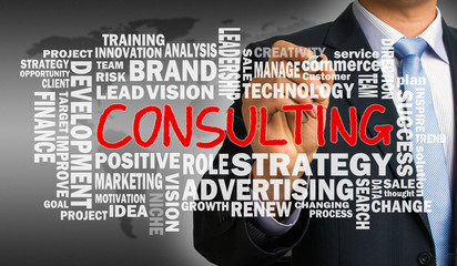 consulting word cloud concept hand drawn by businessman