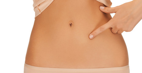 woman pointing finger to belly