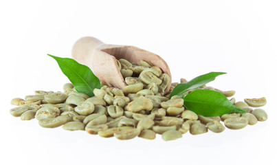 green coffee beans in wooden bowl