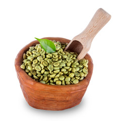 green coffee beans in wooden bowl