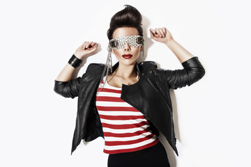 rock n roll woman in glasses and black jacket