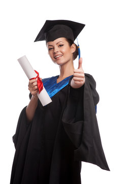  young woman college graduate portrait wearing cap