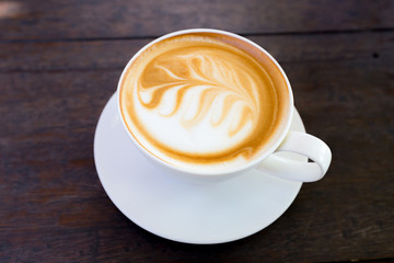 art latte coffee on white cup