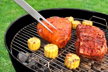 Fork, BBQ Pork Knuckle and  Spareribs On The Flaming Grill
