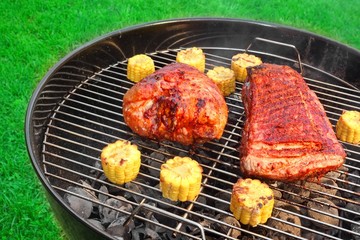 Barbecue Pork Eisbein And Spareribs on The Flaming Charcoal Gril