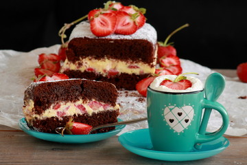 coffee and cake with chocolate and strawberries