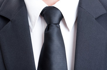 Black suit and tie