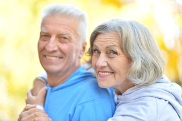 Senior couple in autumn park