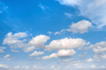 Naklejka na ściany i meble Blue sky with white clouds. Nature background. Environment