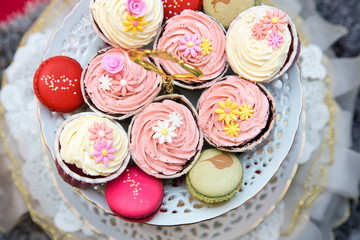 Cupcakes And Macarons On A Tray As A Wedding Gift 
