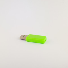 Green USB memory stick isolated on white