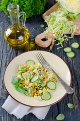 Cabbage salad with cucumber and carrots
