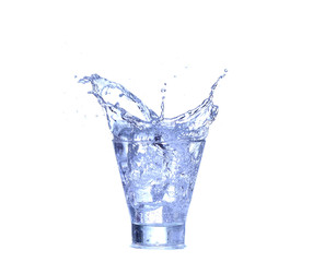 Glass of water, ice and slice of fresh lemon on a white background