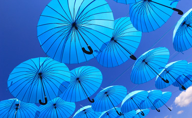 Fototapeta na wymiar colorful umbrellas in the sky 