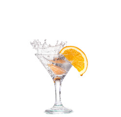 cocktail in a martini glass on a white background with fruit