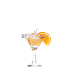 cocktail in a martini glass on a white background with fruit