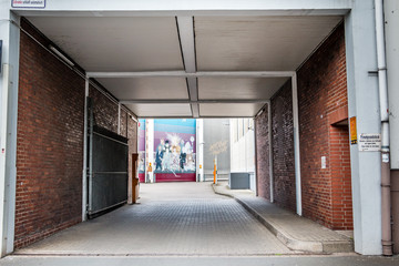 Fototapeta na wymiar Brick wall entrance with painting