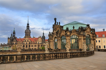 Obraz premium Closeup stone figure and Residenzschloss (city hall) on the back