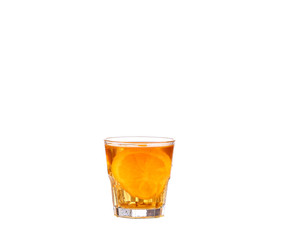 Amber cocktail in a glass isolated on a white background