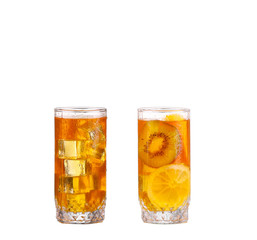 Amber cocktail in a glass isolated on a white background