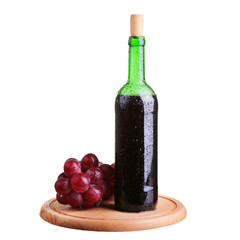Obraz premium wine glass with red wine, bottle of wine and grapes isolated over white background