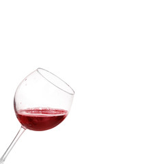Red wine in glass isolated on white