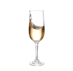 Champagne in a glass. Isolated on white background