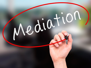 Man Hand writing Mediation with marker.