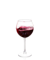 Red wine pouring on white background