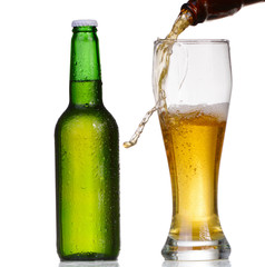 Beer bottle with drops isolated on wgite