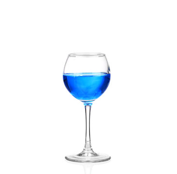 blue cocktail with splashes on white