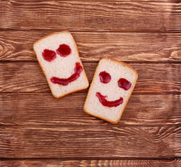 Two slices of bread with smiles