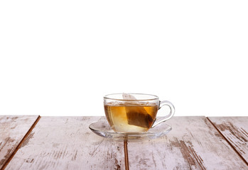 Cup tea with mint and lemon isolated on a white background