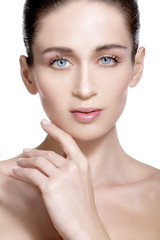 Obraz na płótnie Canvas Beauty model showing clean fresh healthy skin