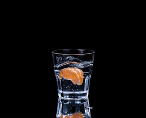 water on a glass on dark background.