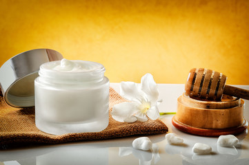 Honey moisturizer front view with yellow background