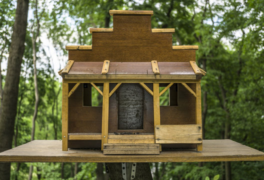 Wooden birdhouse in the forest